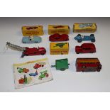 A small collection of Dinky Toys vehicles, comprising a No. 107 Sunbeam, a No. 157 Jaguar XK120, a