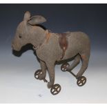 An early 20th Century Steiff felt donkey with button in left ear, boot button eyes and leather