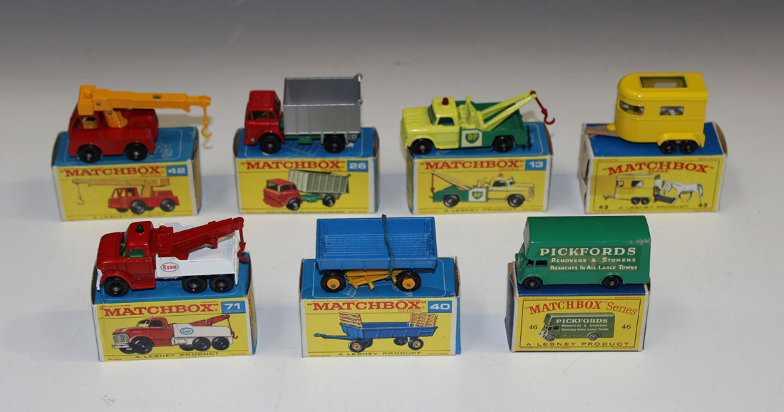 Sixteen Matchbox Series 1-75 vehicles, including a No. 30 eight wheel crane, a No. 46 removal van '