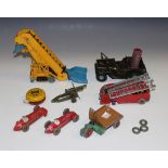 A small collection of Dinky Toys and Supertoys vehicles, comprising a No. 964 elevator loader, a