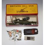 A Britains No. 2064 155mm gun, boxed, a Knight's Head platform truck, boxed, a small collection of