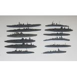 A collection of die-cast naval ships and cruise liners, including HMS Hood, Dunkerque, HMS York,