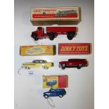 Three Dinky Toys cars, comprising a No. 174 Hudson Hornet sedan, a No. 257 Canadian fire chief's car