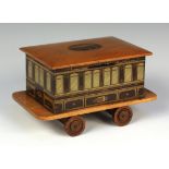 A late Victorian Mauchline ware boxwood novelty money box in the form of a 'Pullman Parlor Car