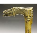 A 19th Century wooden walking stick, the handle carved in the form of a horse's head, the reverse