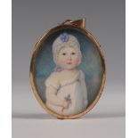 19th Century British School - Oval Miniature Half Length Portrait of a Child holding a Rattle,