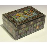 An early 20th Century painted rectangular box, probably Scandinavian, the hinged lid decorated