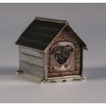 A Victorian silver novelty vesta case in the form of a dog kennel, the front enamelled with the head