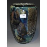 A studio art glass vase by Jean Claude Novarro, the mottled glass ovoid body with gilt inclusions,