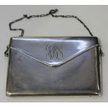 A George V silver card case in the form of an envelope with sprung hinged lid, Chester 1912 by Clark