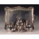 A late 19th Century French silver four piece tea set and matching two handled tray, comprising