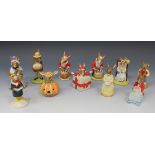 A group of eleven Royal Doulton Bunnykins figures, comprising two 'Santa Happy Christmas', DB17, '