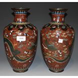 A pair of Japanese cloisonné vases, Meiji period, each ovoid body decorated with a dragon and