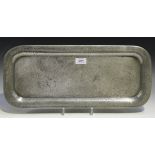 A Tudric pewter rectangular tray with overall planished decoration, bearing number '01304', length