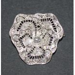 A diamond set brooch, designed as a pansy, mounted with circular cut diamonds with the principal