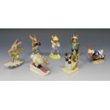 Seven Royal Doulton Bunnykins figures, comprising 'Touchdown', DB29, 'Knockout', DB30, 'Downhill',