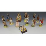 A collection of thirteen Royal Doulton Bunnykins figures, comprising 'Sleepytime', DB15, '