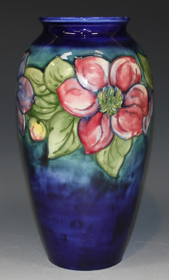 A Moorcroft pottery vase, circa 1949-1983, of elongated ovoid form, decorated with Clematis design