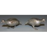 A pair of cast silver models of grouse, London 1974 by Garrard & Co Ltd, length approx 7.8cm.