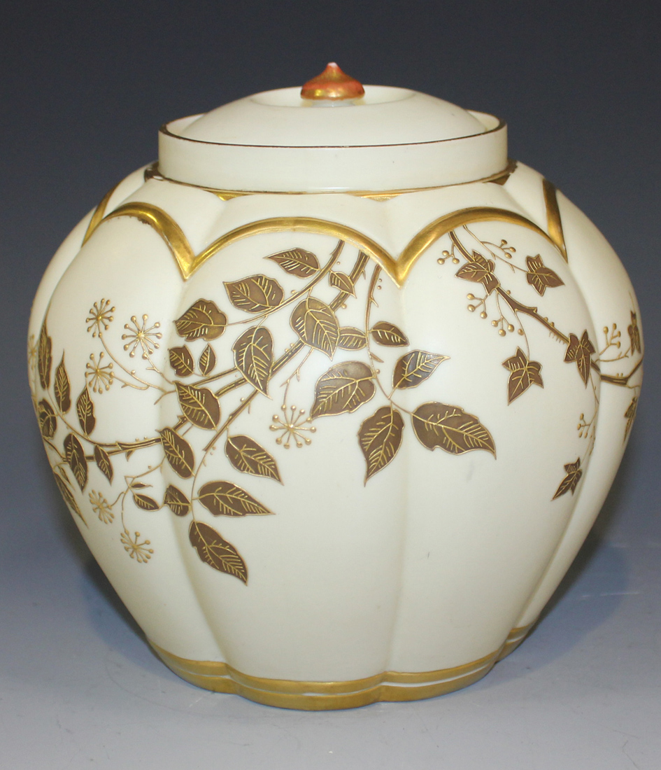 A Royal Worcester porcelain potpourri jar and inner cover, circa 1888, the lobed ovoid body