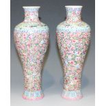 A pair of Chinese famille rose enamelled porcelain meiping, mark of Qianlong but Republic period,