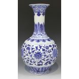 A Chinese blue and white porcelain bottle vase, mark of Xuande but modern, decorated with a