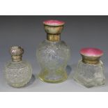 A George V silver and pink enamel perfume bottle and stopper, the hinged lid above a baluster body