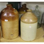 An early 20th Century stoneware bottle, the neck impressed 'Challen and Son ... Storrington', height