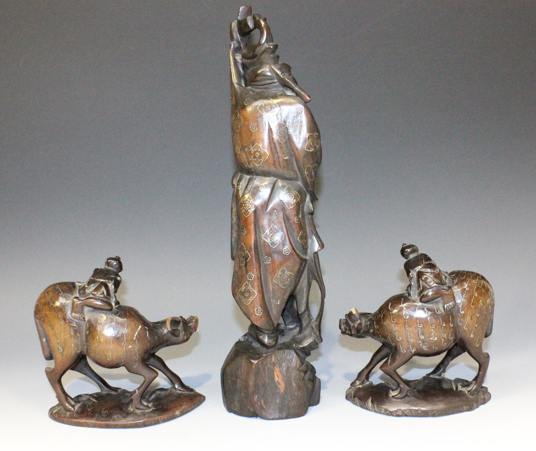 A group of three Chinese wire inlaid carved hardwood figures, late 19th/early 20th Century, - Image 2 of 4