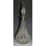 A George V silver mounted cut glass decanter and stopper of tapering form, Birmingham 1925, height