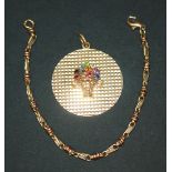 A 9ct gold and vari-coloured gem set circular pendant, the front applied with a gem stone set basket