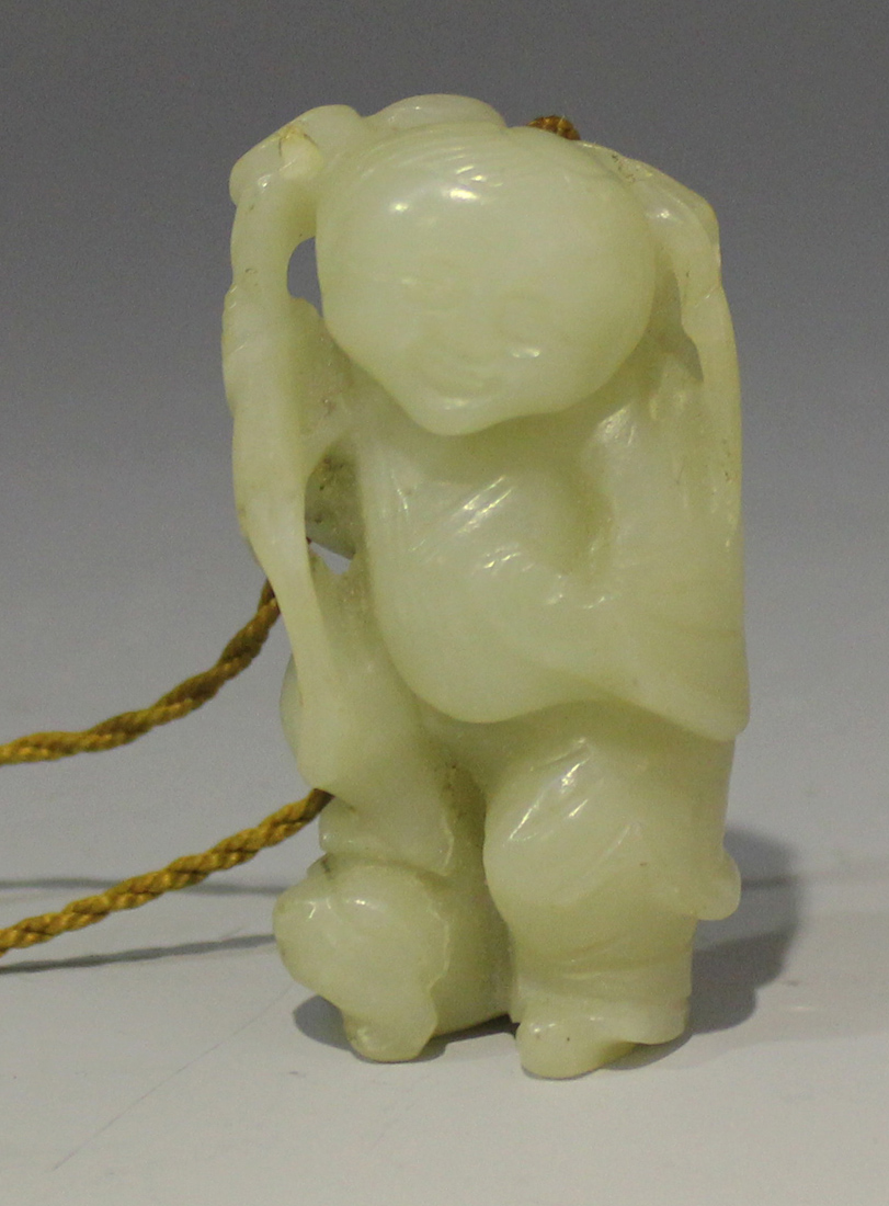 A Chinese carved pale celadon jade pendant of Lui Hai, Qing dynasty, modelled with a string of