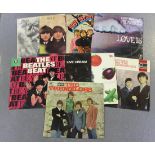 A collection of mainly 1960s LP records, including albums by The Beatles, The Tremeloes, Cream and