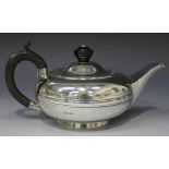 An Edwardian silver teapot of squat circular form, Chester 1904 by William Neale, height approx 10.