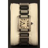 A Cartier Tank steel and diamond set lady's dress wristwatch, the signed squared silver dial with