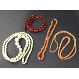 A single row necklace of graduated coral beads, a single row necklace of branch corals, a single row