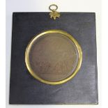 A French Revolution cast bronzed metal medallion by Bertrand Andrieu, inscribed 'Siege de la