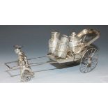 A Chinese sterling silver novelty condiment stand in the form of a rickshaw, fitted with salt and