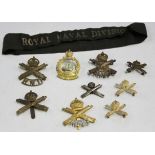 A scarce Royal Naval Division cap tally, a Drake Bn. R.N.D. cap badge, an R.N.D. Machine Gun Bn. cap
