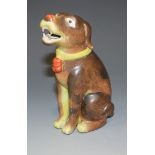 A Chinese export porcelain model of a seated dog, probably late 18th/early 19th Century, with