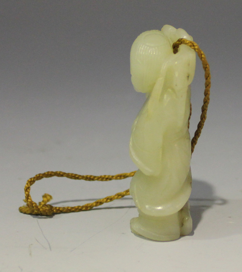 A Chinese carved pale celadon jade pendant of Lui Hai, Qing dynasty, modelled with a string of - Image 4 of 5