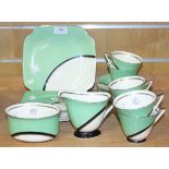 An Art Deco Royal Doulton 'De Luxe' pattern part tea service, decorated in green and white with