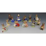 A group of twelve Royal Doulton Bunnykins figures, comprising 'Family Photograph', DB1, two 'Buntie,