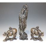 A group of three Chinese wire inlaid carved hardwood figures, late 19th/early 20th Century,