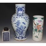 A Chinese blue and white baluster vase, late 19th Century, decorated with floral, bird and butterfly