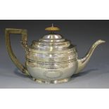 A George III silver oval teapot engraved with foliate bands, London 1806 by Charles Fox I, height