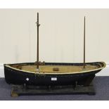 A 20th Century model of a Brixham trawler with blue painted hull and weighted keel, length approx