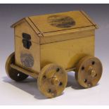 A late Victorian Mauchline ware novelty box in the form of a bathing carriage, the hinged lid and