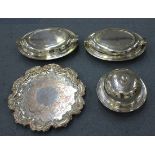 A pair of Art Deco plated oval entrées dishes and covers, a plated on copper salver, a Mappin & Webb