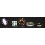 A 9ct gold, opal and amethyst set marquise cluster ring, a gold and garnet set oval cluster ring, an
